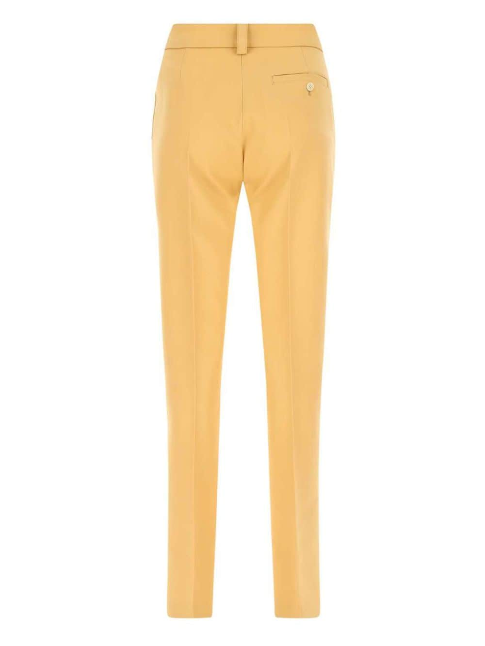 Shop Quira Slim Cut Trousers In Orange