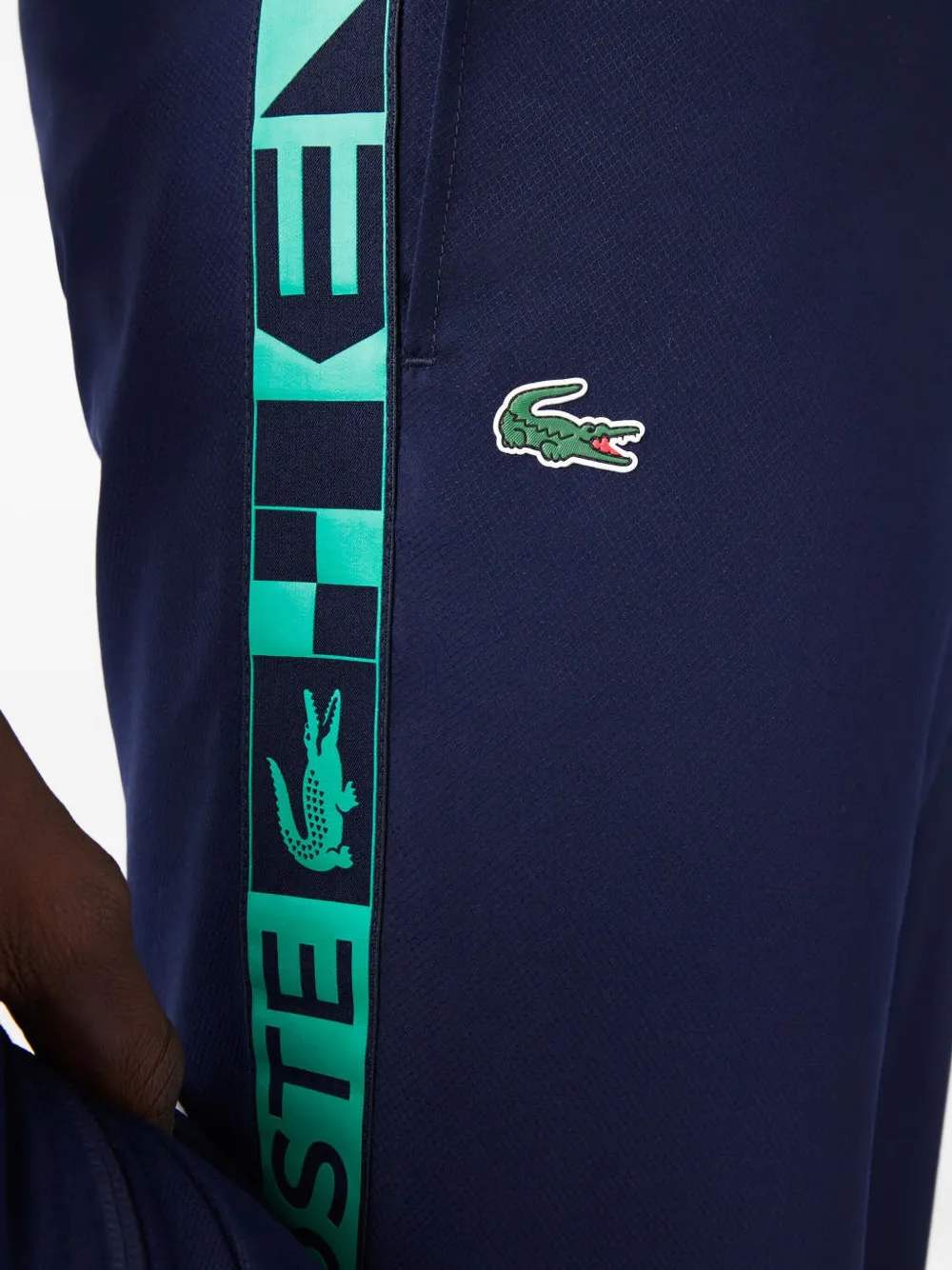 Lacoste logo-tape elastic-cuff trousers Blauw
