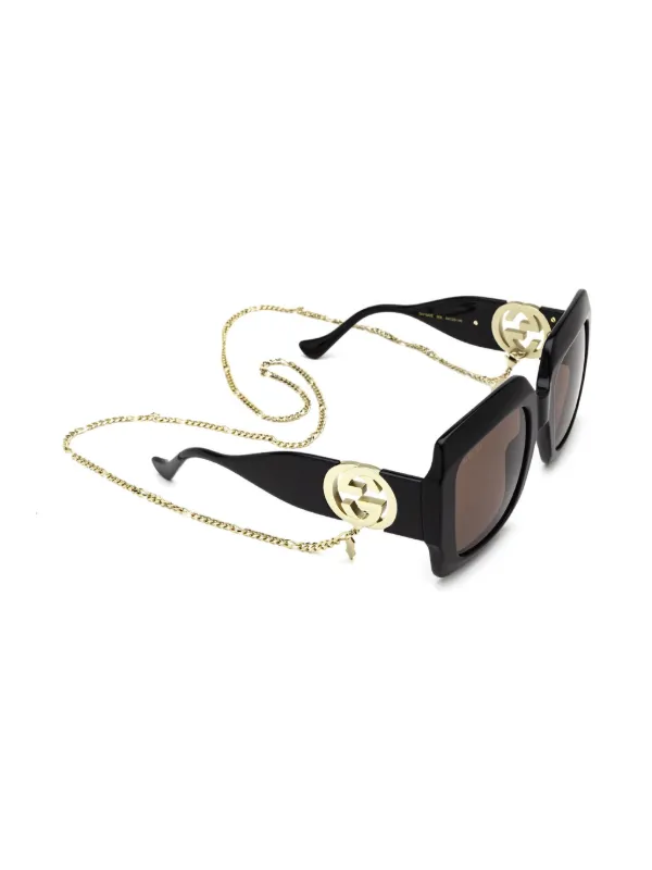 Gucci Eyewear Interlocking G Sunglasses | Brown | FARFETCH ID