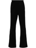 Givenchy logo-embossed track pants - Black