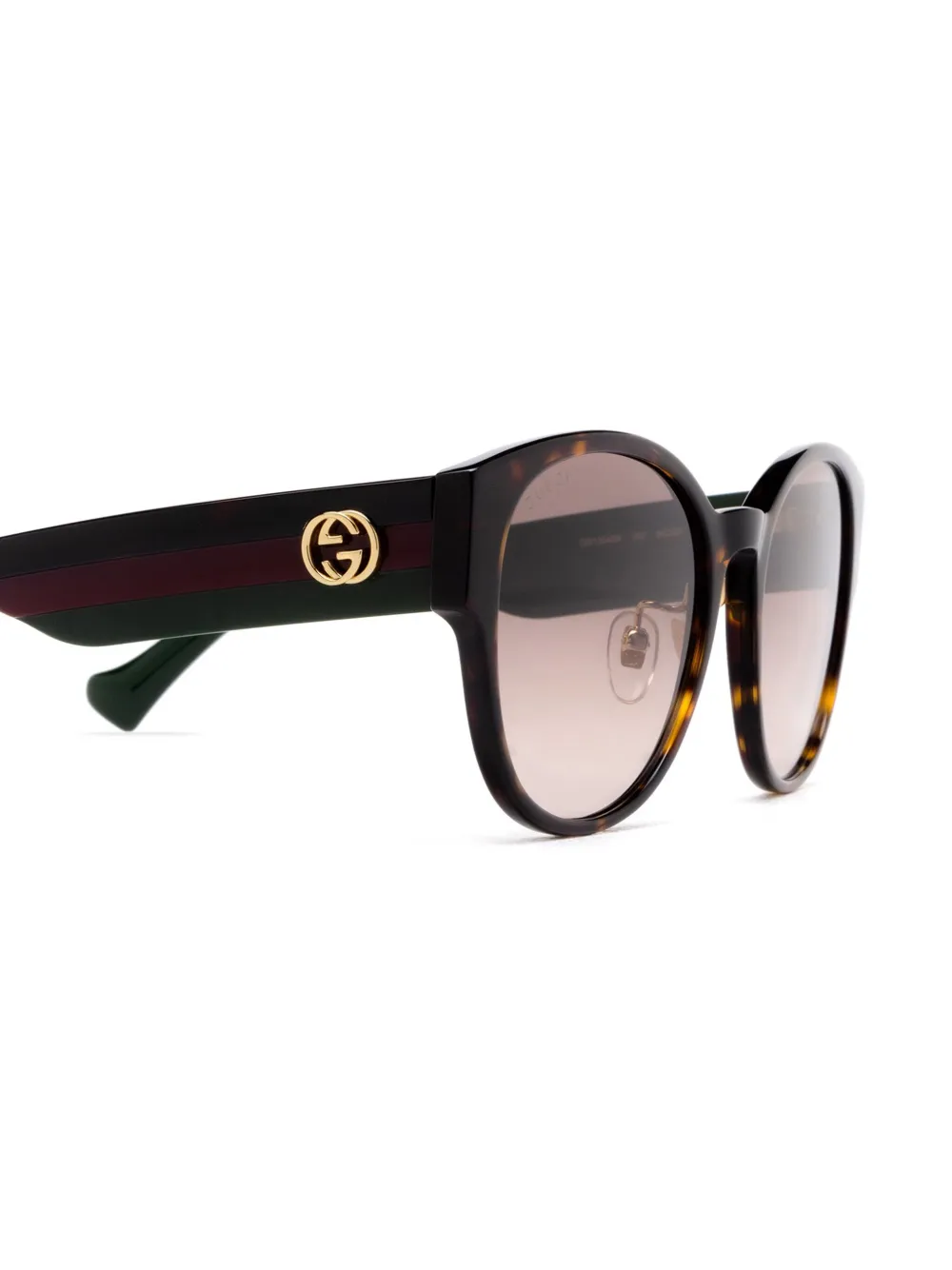 Gucci Eyewear Zonnebril met rond montuur Bruin