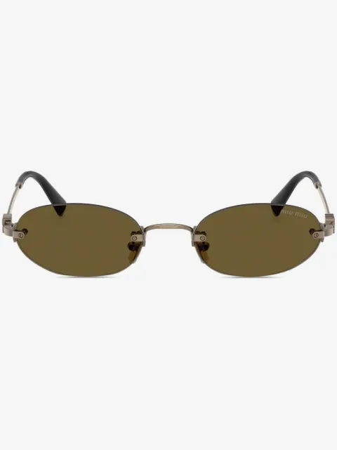 Miu Miu Eyewear lentes de sol con armazón ovalada y detalle del logo