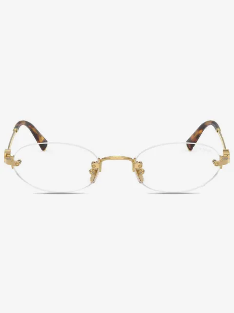 Miu Miu Eyewear очки в овальной безободковой оправе
