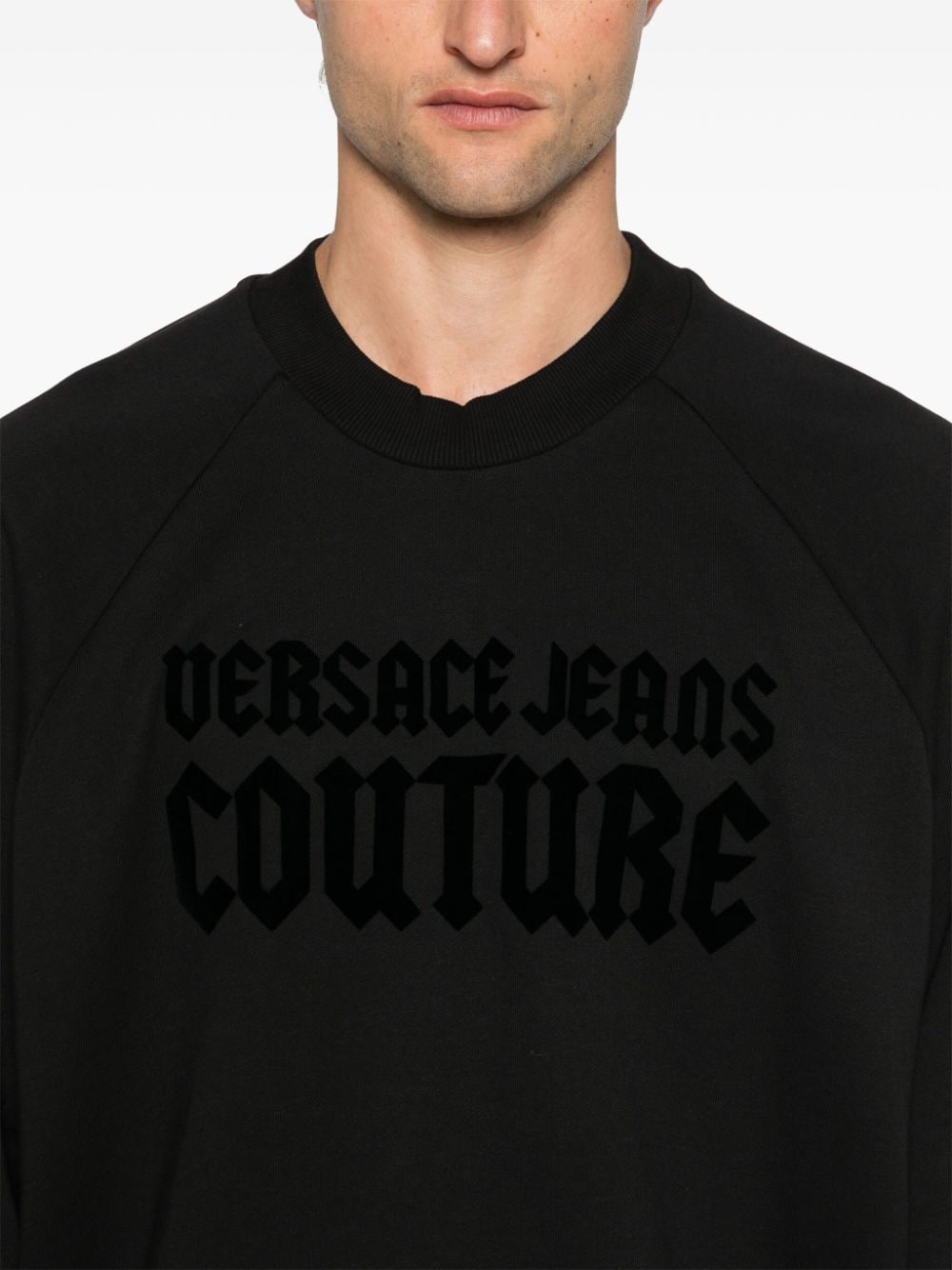 Shop Versace Jeans Couture Flocked-logo Sweatshirt In Black