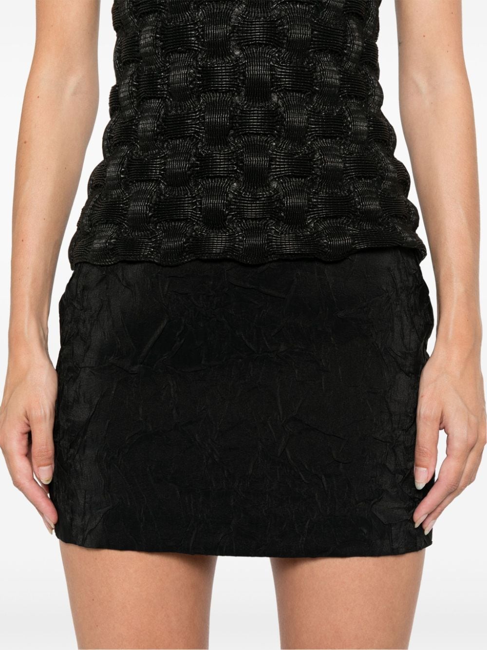 Shop Nanushka Low-rise Mini Skirt In Black