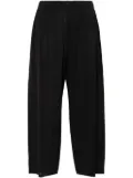 Pleats Please Issey Miyake stripe-pattern trousers - Black