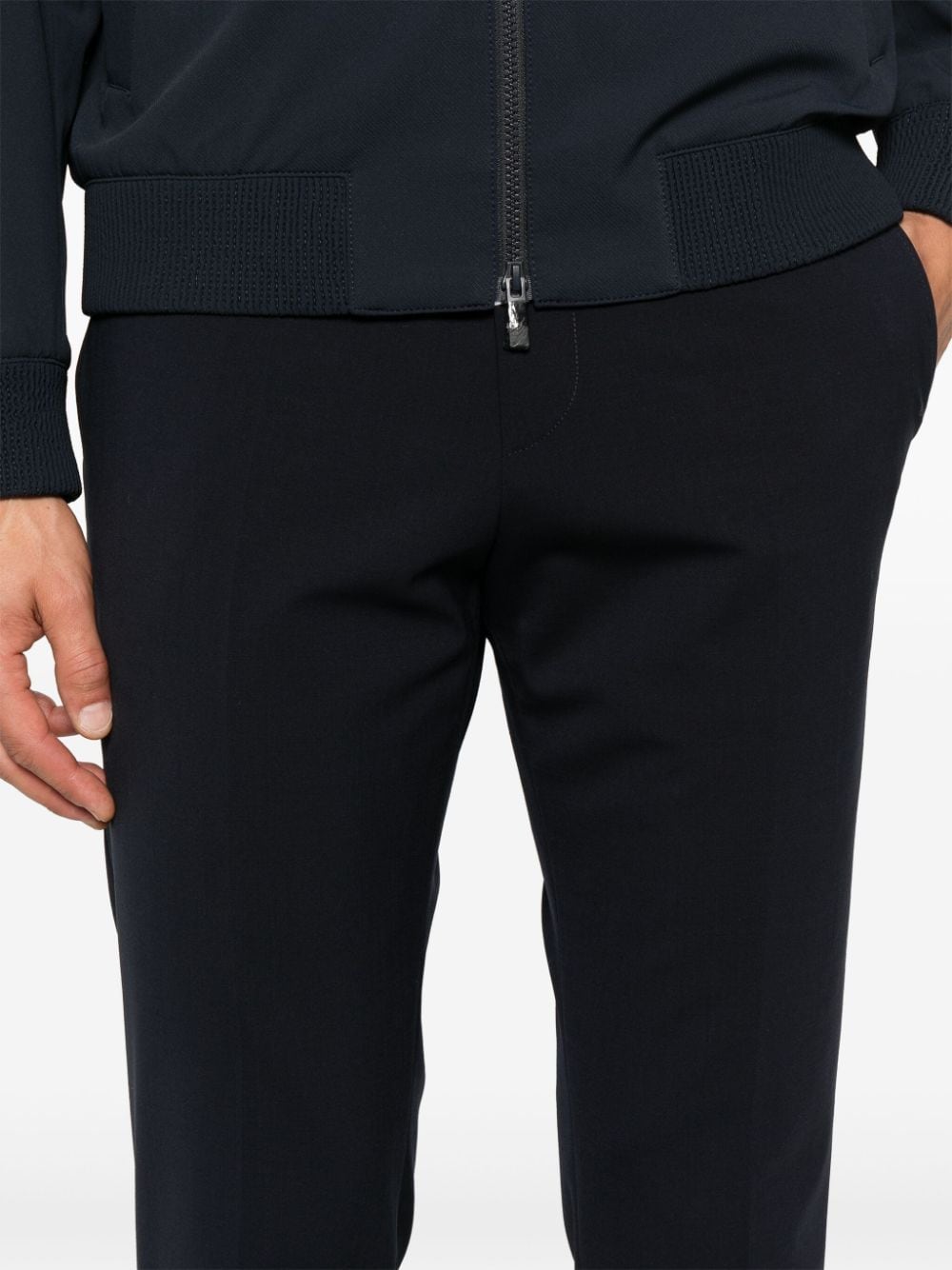 Shop Hugo Boss Tapered Trousers In Blue