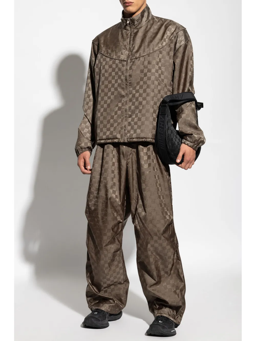 MISBHV monogram-jacquard cotton-blend trousers - Groen