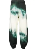 Undercover graphic-print track pants - White