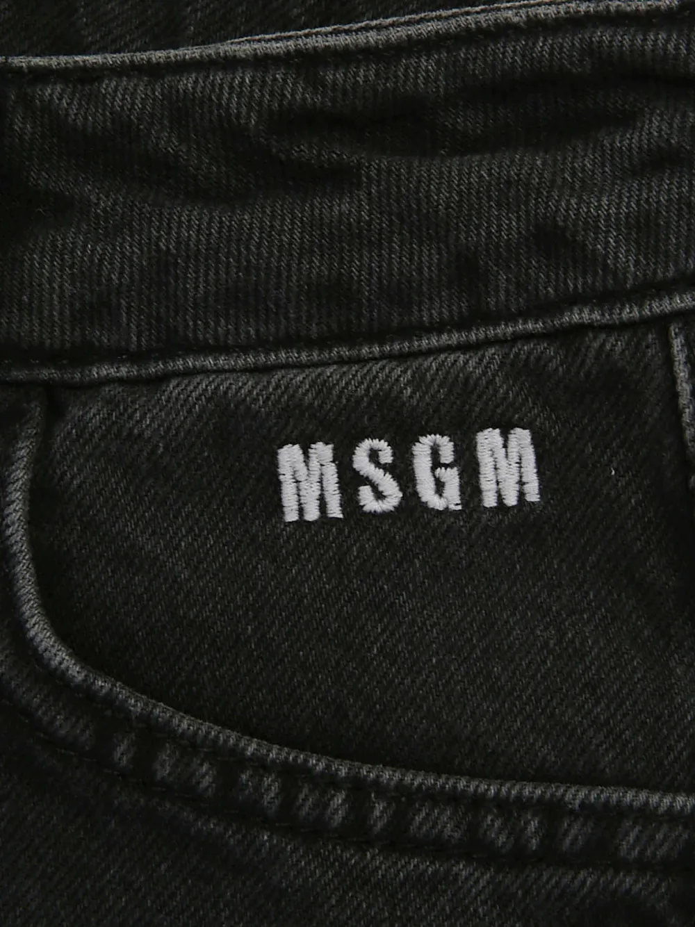Shop Msgm Logo-embroidered Jeans In Black