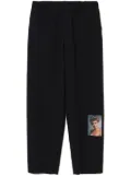 Undercover Twin Peaks printed trousers - Blue