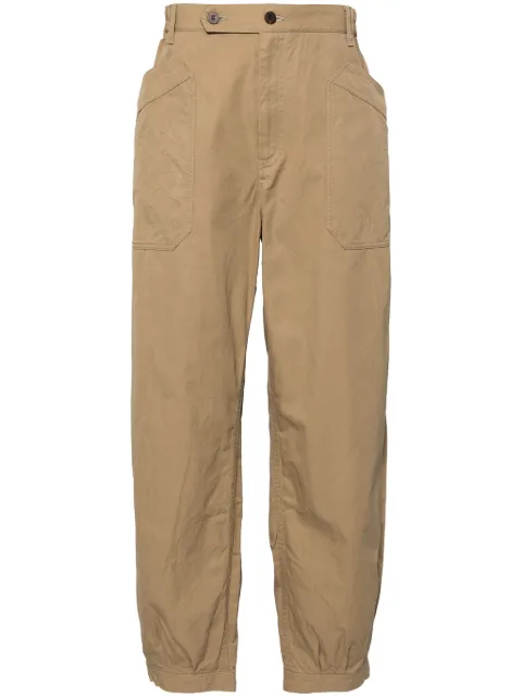 visvim Calça com abotoamento na barra