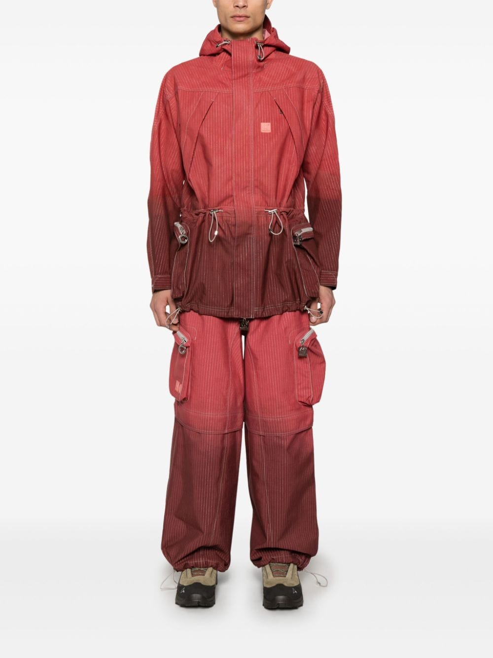 66 North x Charlie Constantinou dyed reflective trousers - Rood