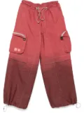 66 North x Charlie Constantinou dyed reflective trousers - Red