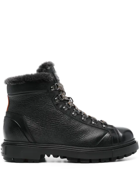 Santoni bottines en cuir à bord en peau lainée