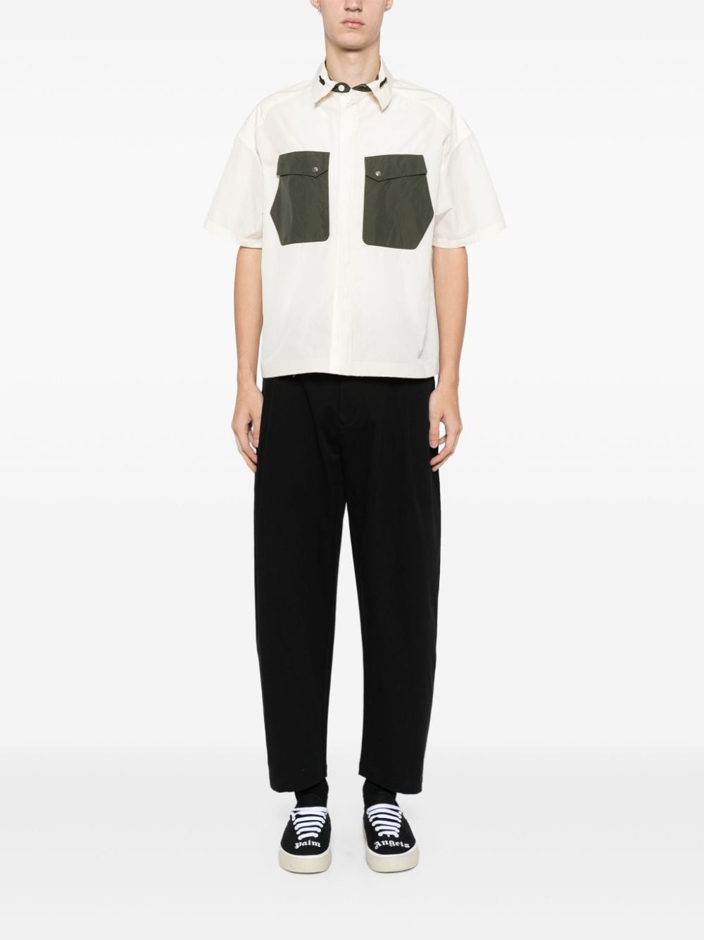 Shop Croquis Pleat-detailing Tapered Trousers In Black