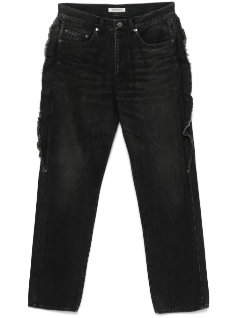 Undercover frayed-detailed jeans