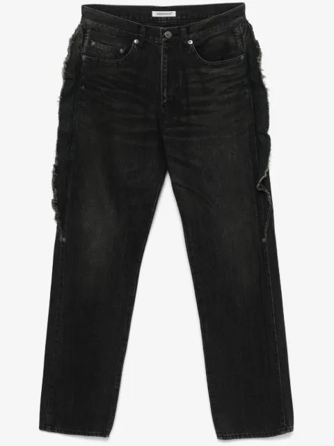 Undercover Jeans con frange