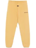 FEAR OF GOD ESSENTIALS drop-crotch track pants - Yellow