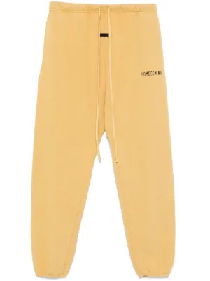 FEAR OF GOD ESSENTIALS drop-crotch Track Pants | Yellow | FARFETCH