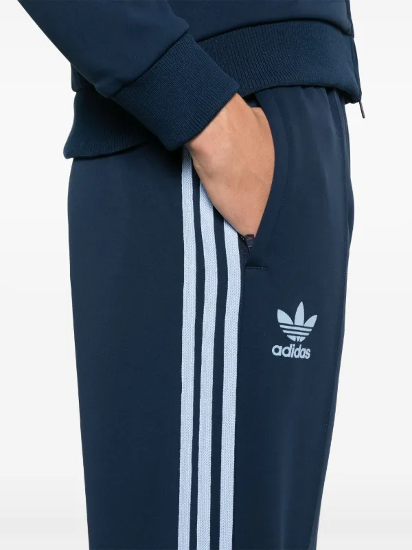 Adidas pants blue stripes online