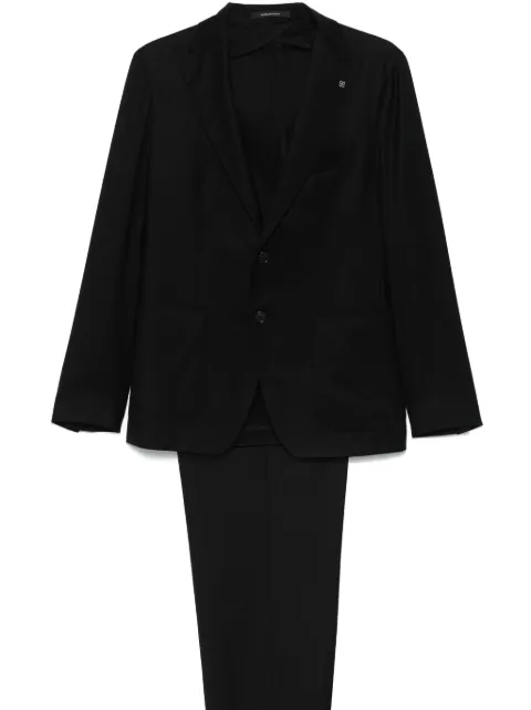 Tagliatore traje con botones
