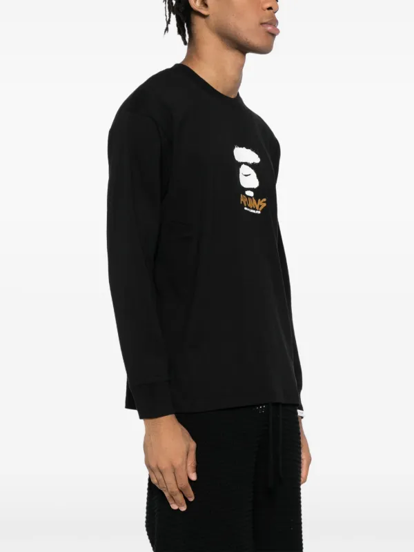 【AAPE by A BATHING APE】Moonface ロゴ グラフィック Tシャツ AAPE BY *A BATHING APE® Moonface Logo T-shirt | Black | FARFETCH