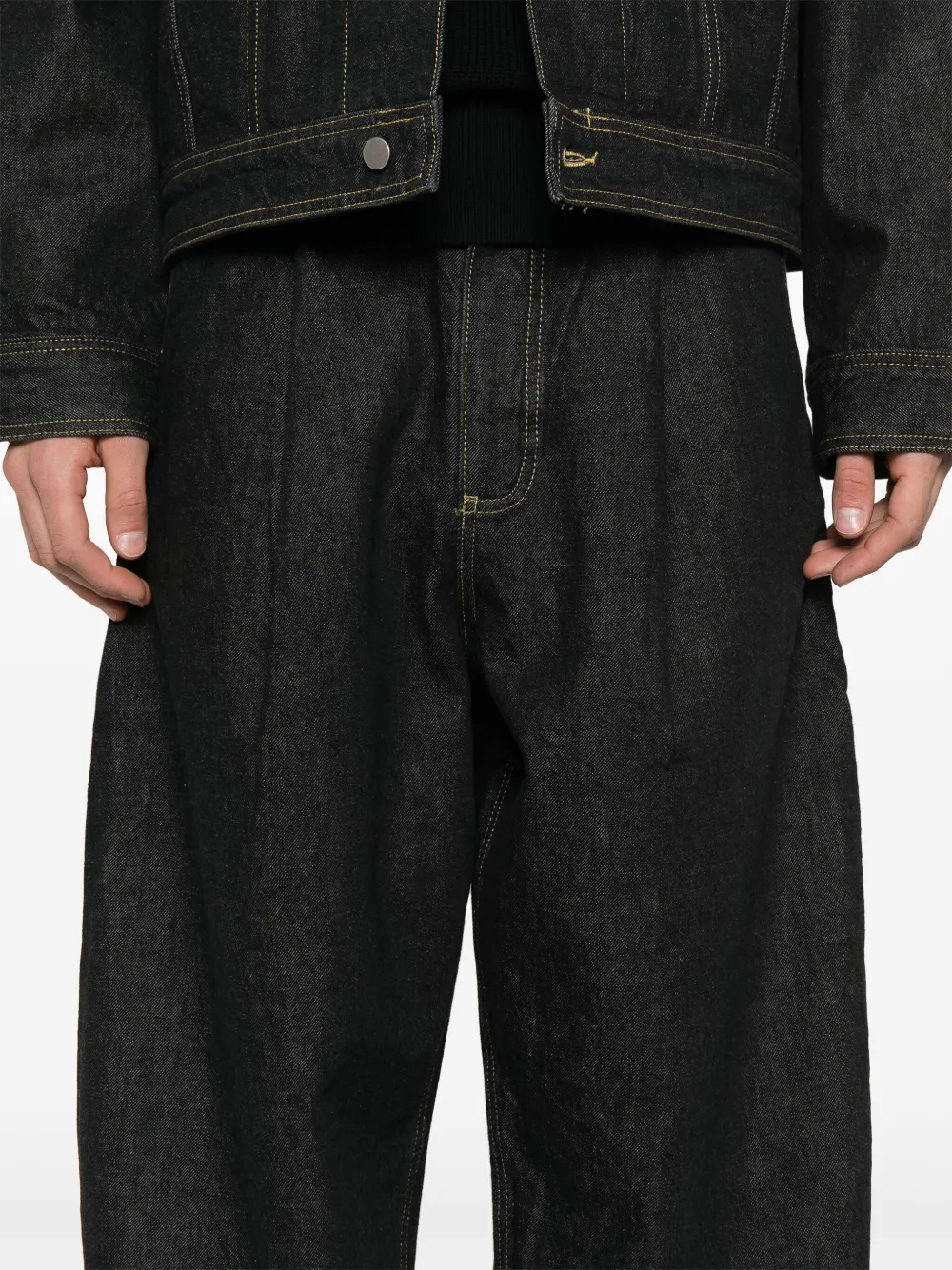 Studio Nicholson Jeans met geplooid detail Zwart
