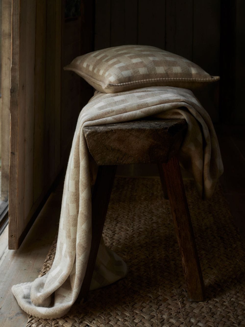 Shop Johnstons Of Elgin Stitched Basketweave Throw In Neutrals