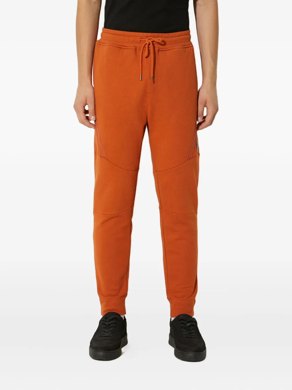 C.P. Company zip-detail track pants | Orange | Image 1