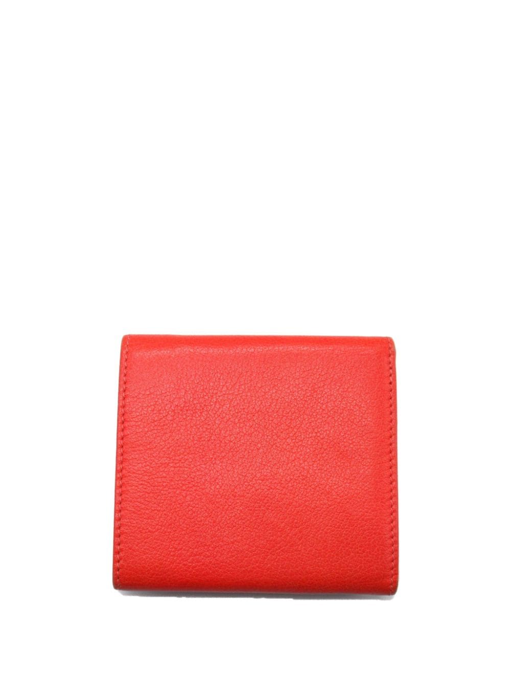 CHANEL Pre-Owned 2009-2010 Camellia tri-fold wallet - Oranje