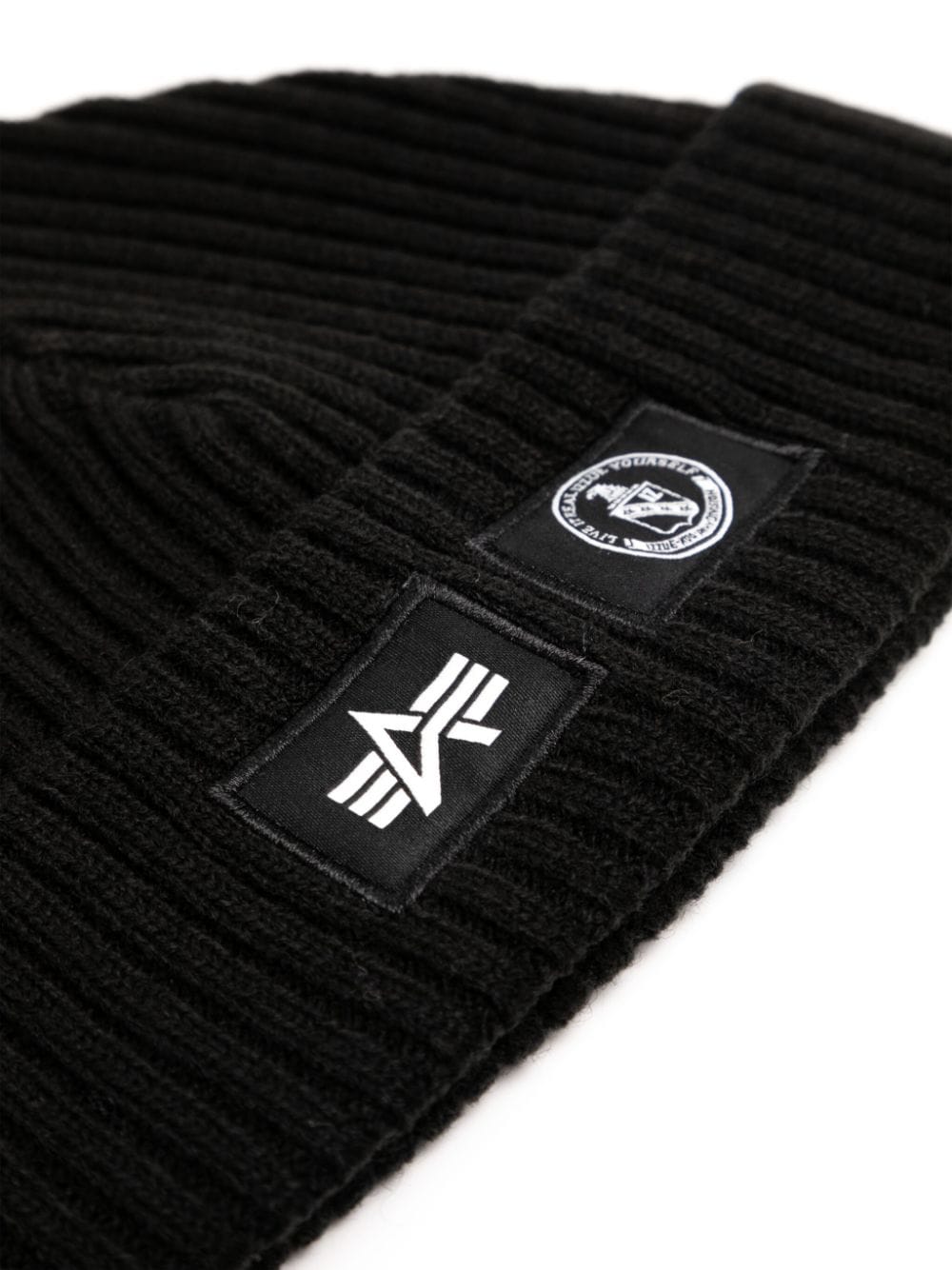 Shop Izzue Logo-patch Ribbed Knit Beanie In Black