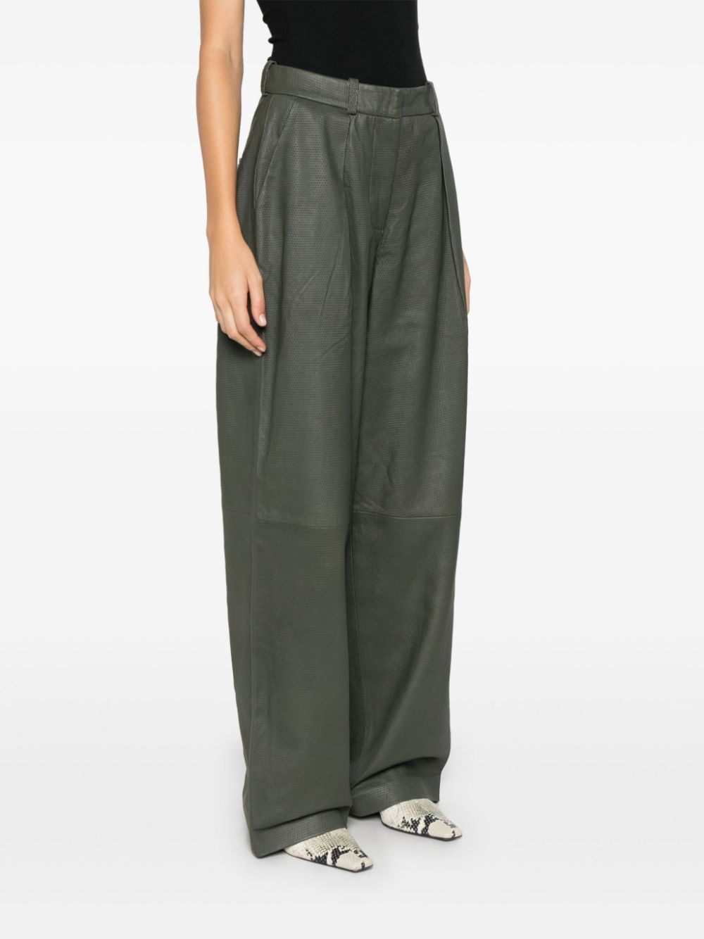 Shop Remain Tapered Leather Trousers In Green