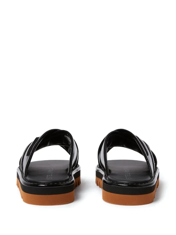 Stella McCartney patent-finish Slides | Black | FARFETCH