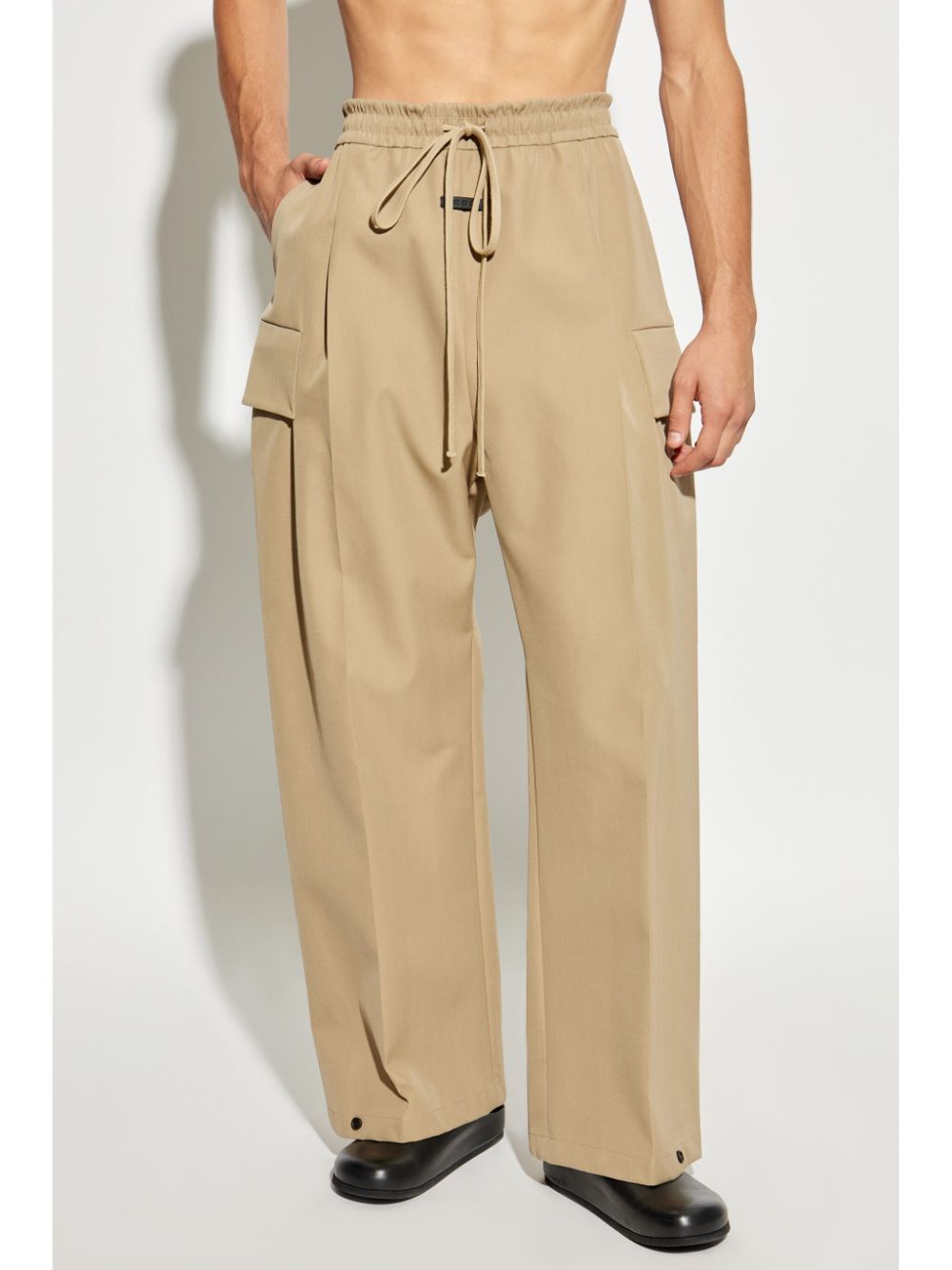 Shop Fear Of God Logo-patch Wool Trousers In 260 Dune