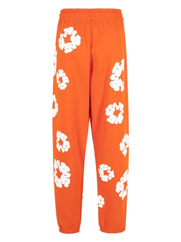Denim Tears The Cotton Wreath Track Pants | Orange | FARFETCH