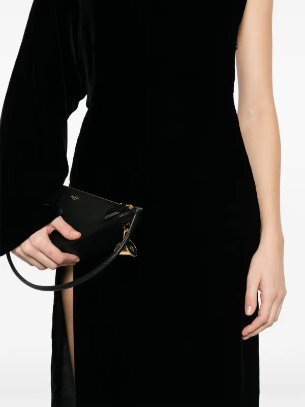 Interlocking G and bee engraved ring