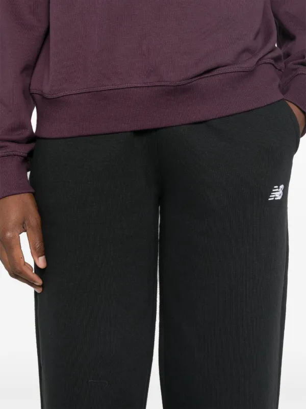 New Balance logo-embroidered Track Pants | Black | FARFETCH