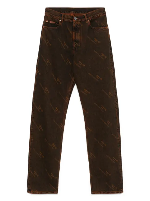 Martine Rose jeans con logo estampado