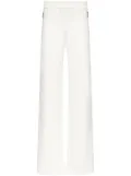 AREA embossed handprint track pants - White