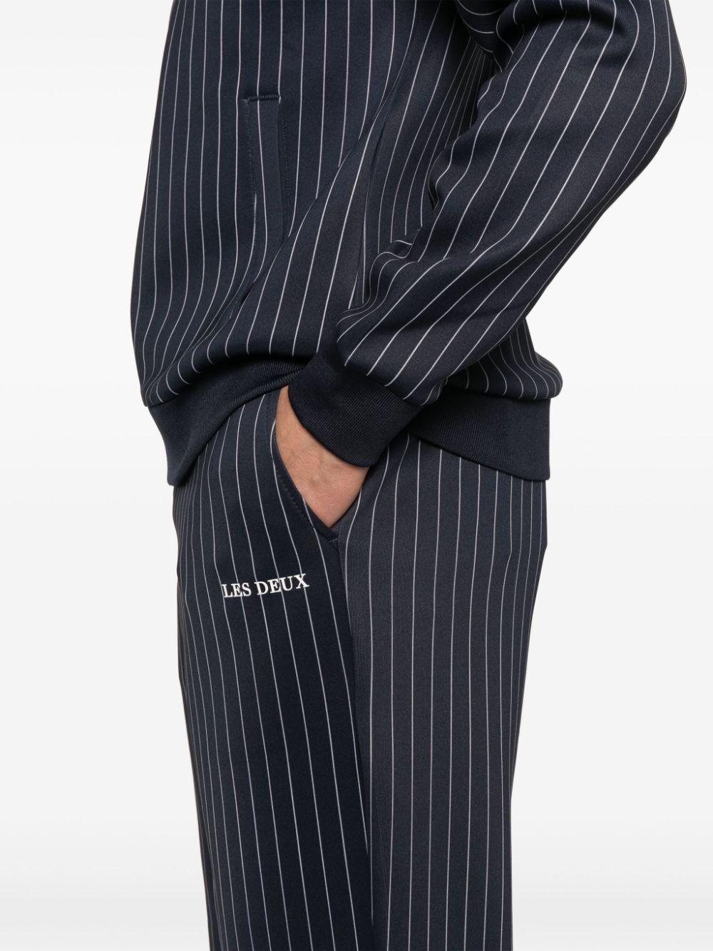 Shop Les Deux Pinstriped Track Trousers In Blue