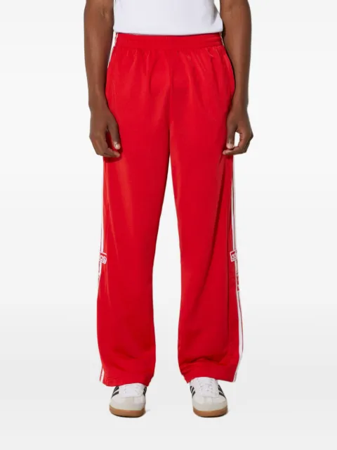 adidas three-stripe side-button trousers