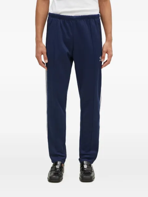 adidas pantalones con tres rayas