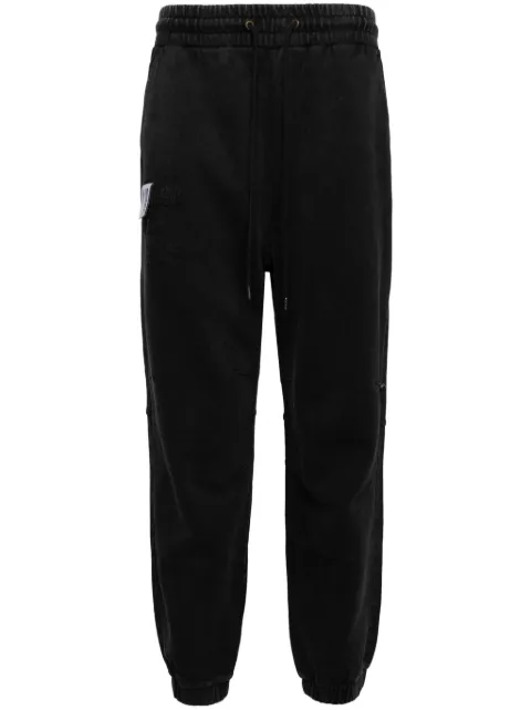 Musium Div. logo-patch track pants
