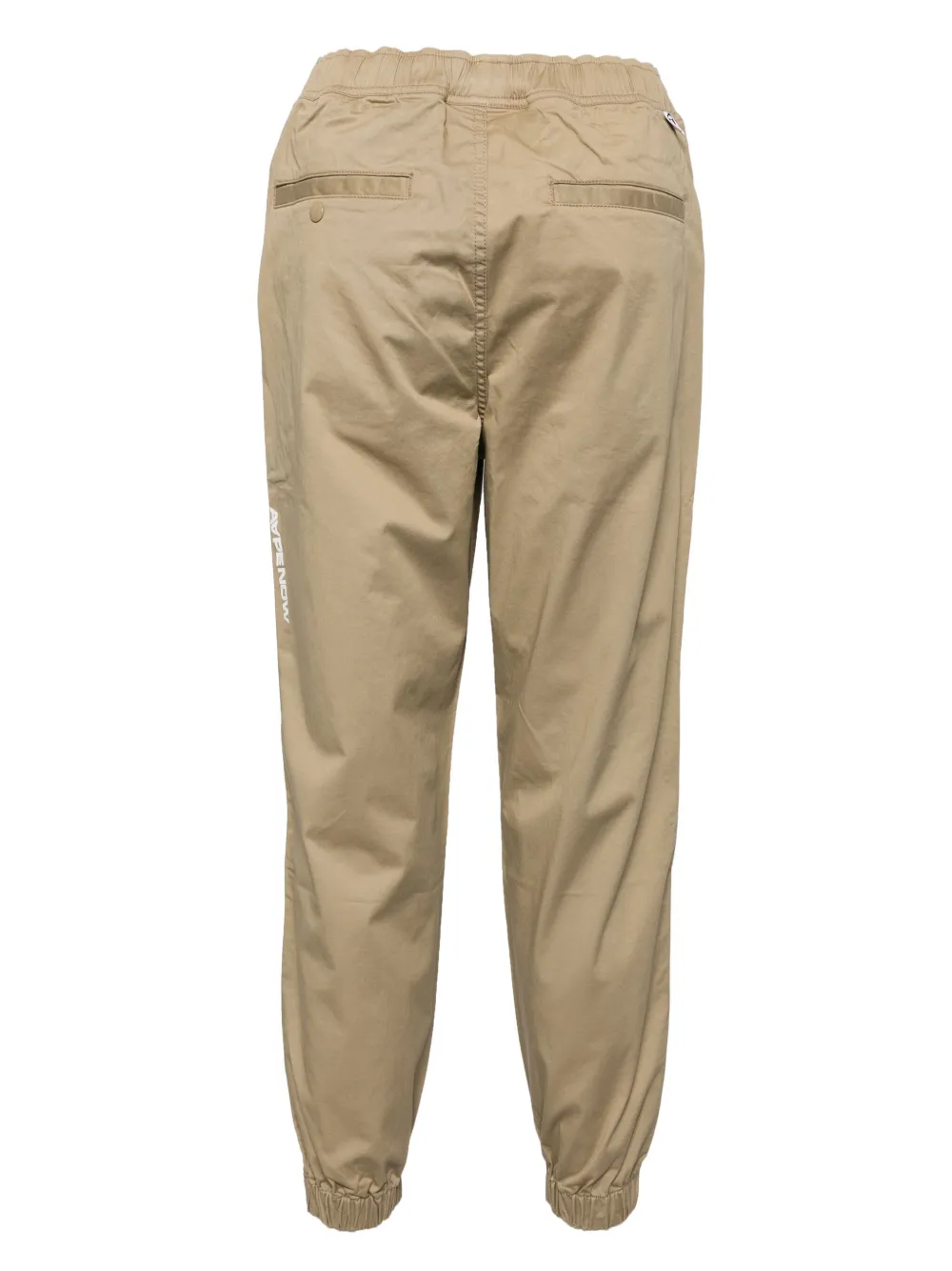 aapeby*abathingape AAPE BY *A BATHING APE Moonface broek met logo - Beige