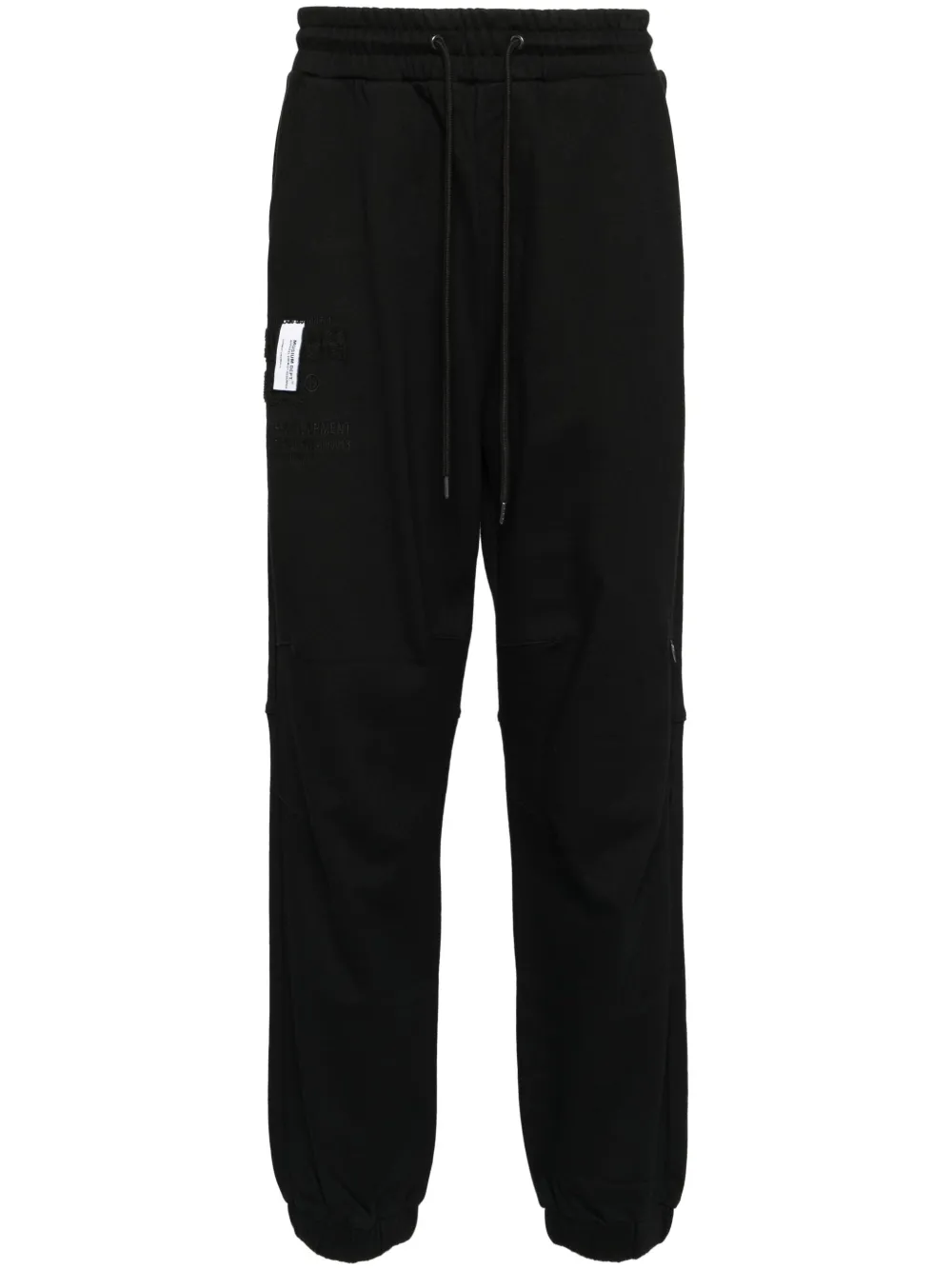 Musium Div. logo-patch track pants | Black | Image 1