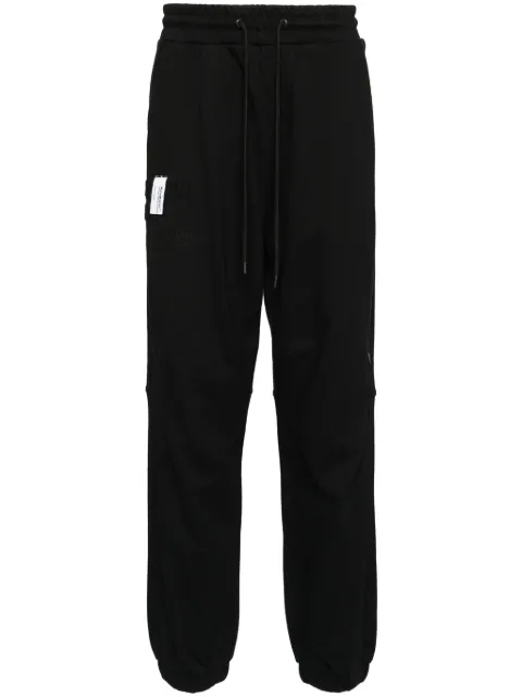 Musium Div. logo-patch track pants