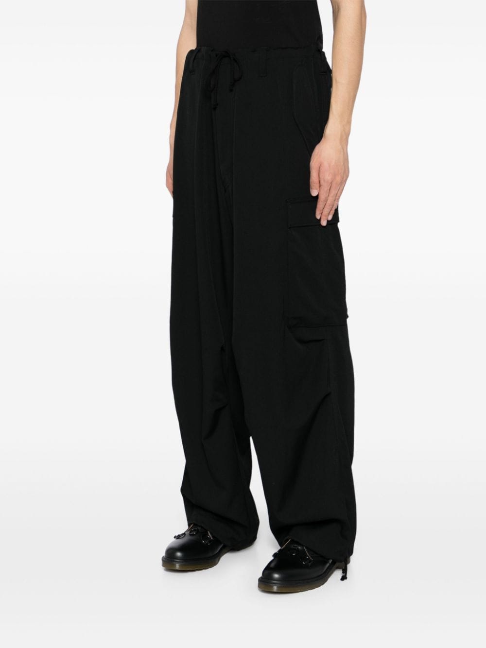 Shop Yohji Yamamoto Loose-fit Wool Trousers In Black