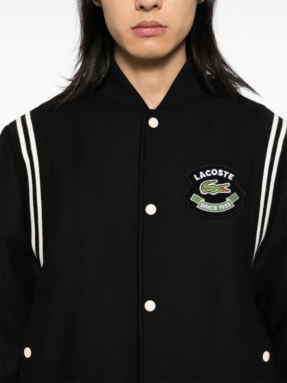 Shop Lacoste Varsity Jacket In Black