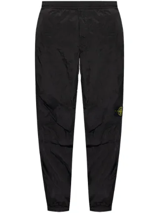 Stone Island ロゴパッチ トラックパンツ | ブラック | FARFETCH JP